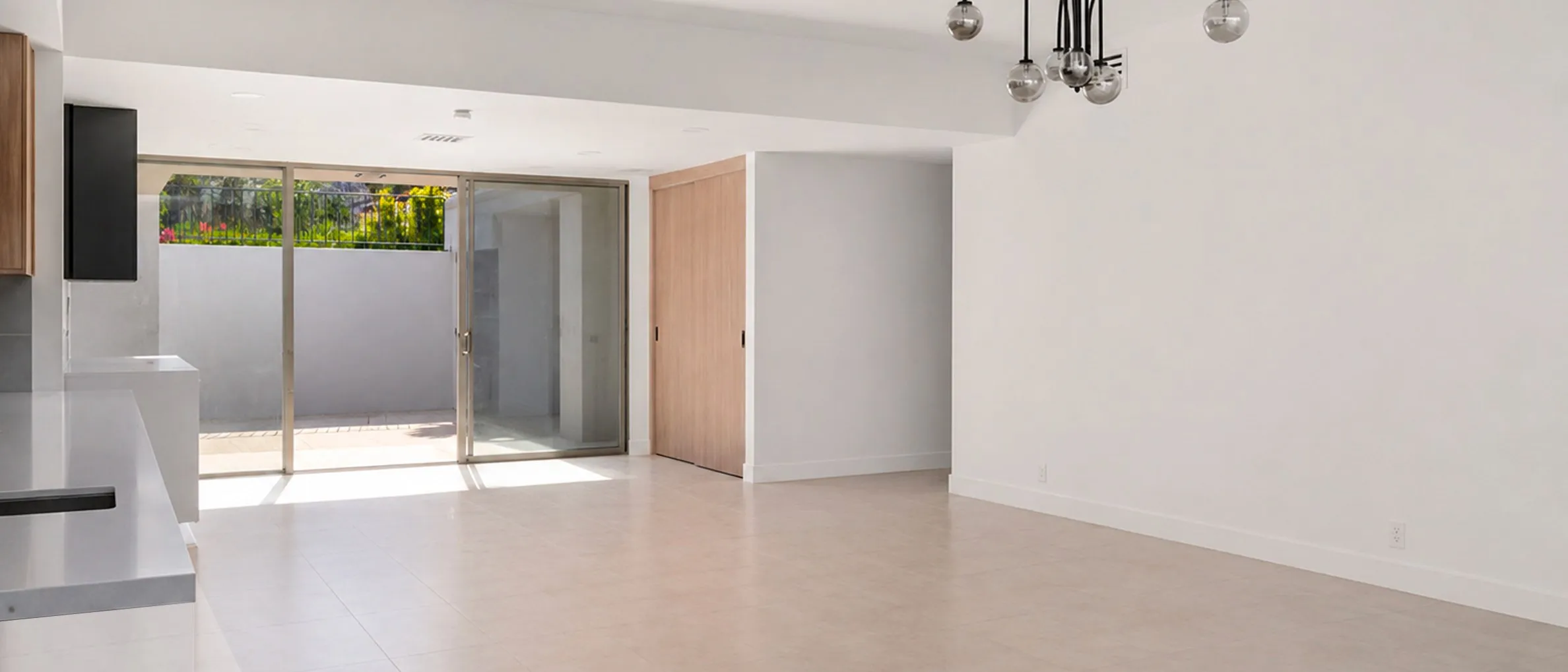 Vacant open-plan living room before staging, Seven Lakes, Palm Springs
