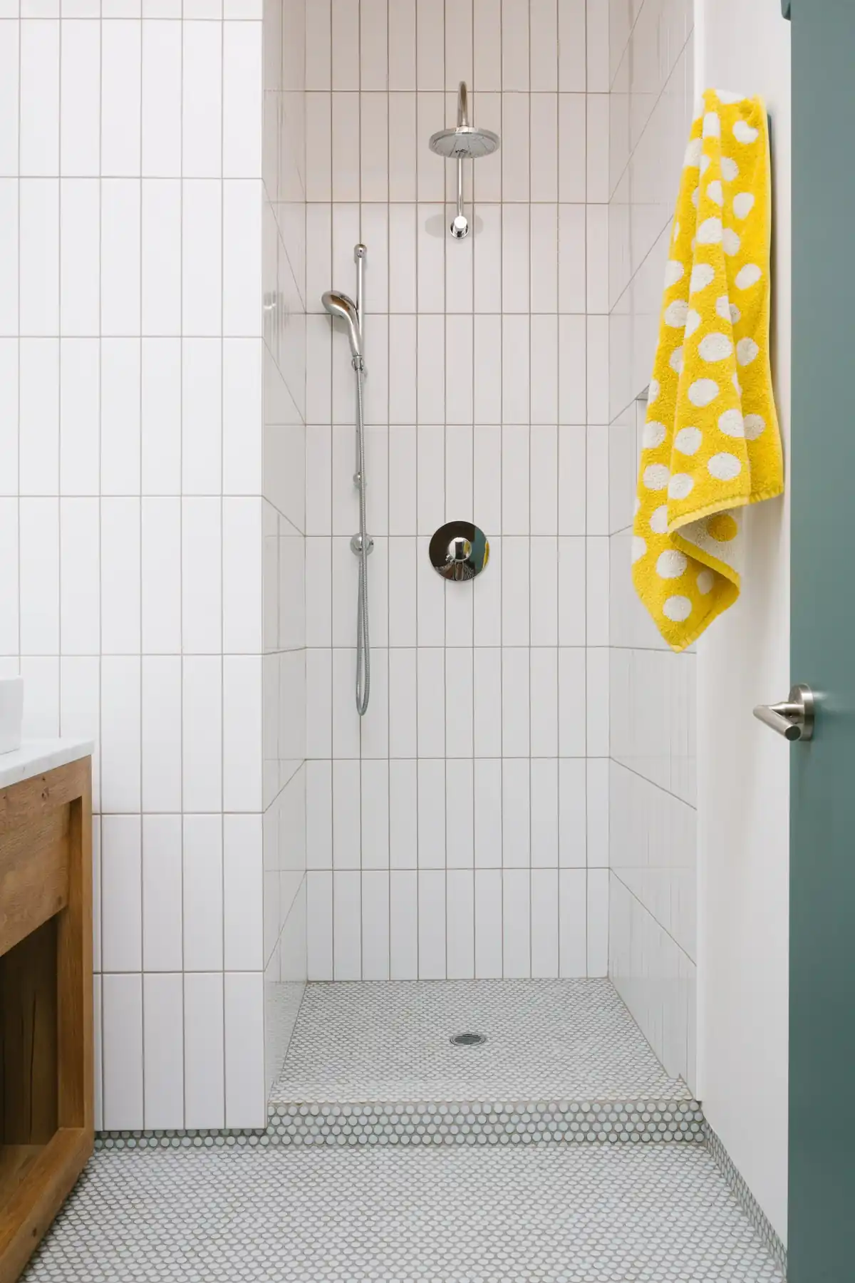 White tile shower with brass fixtures, Bel Air