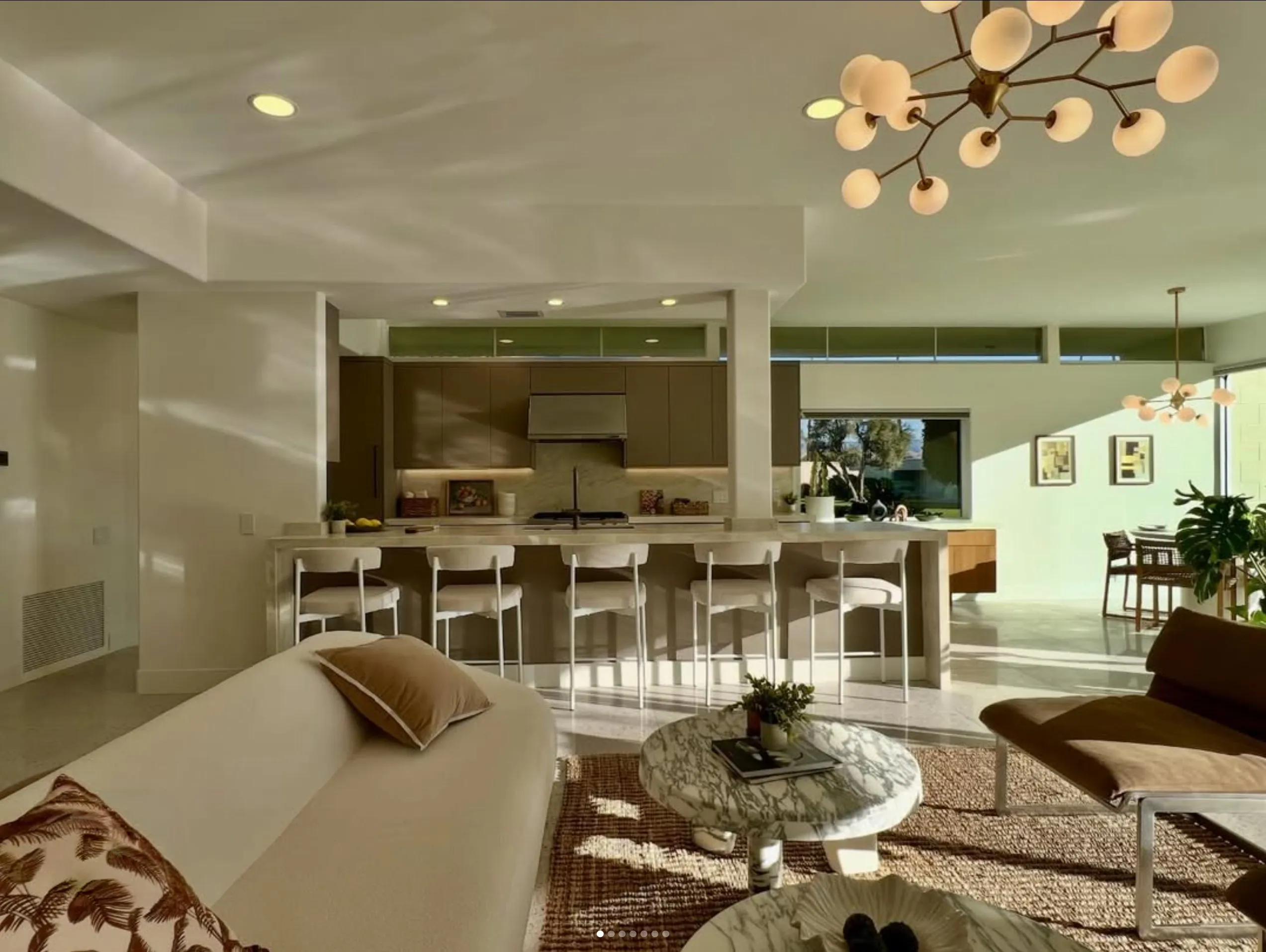 Staged open-plan living and kitchen at golden hour, Seven Lakes, Palm Springs