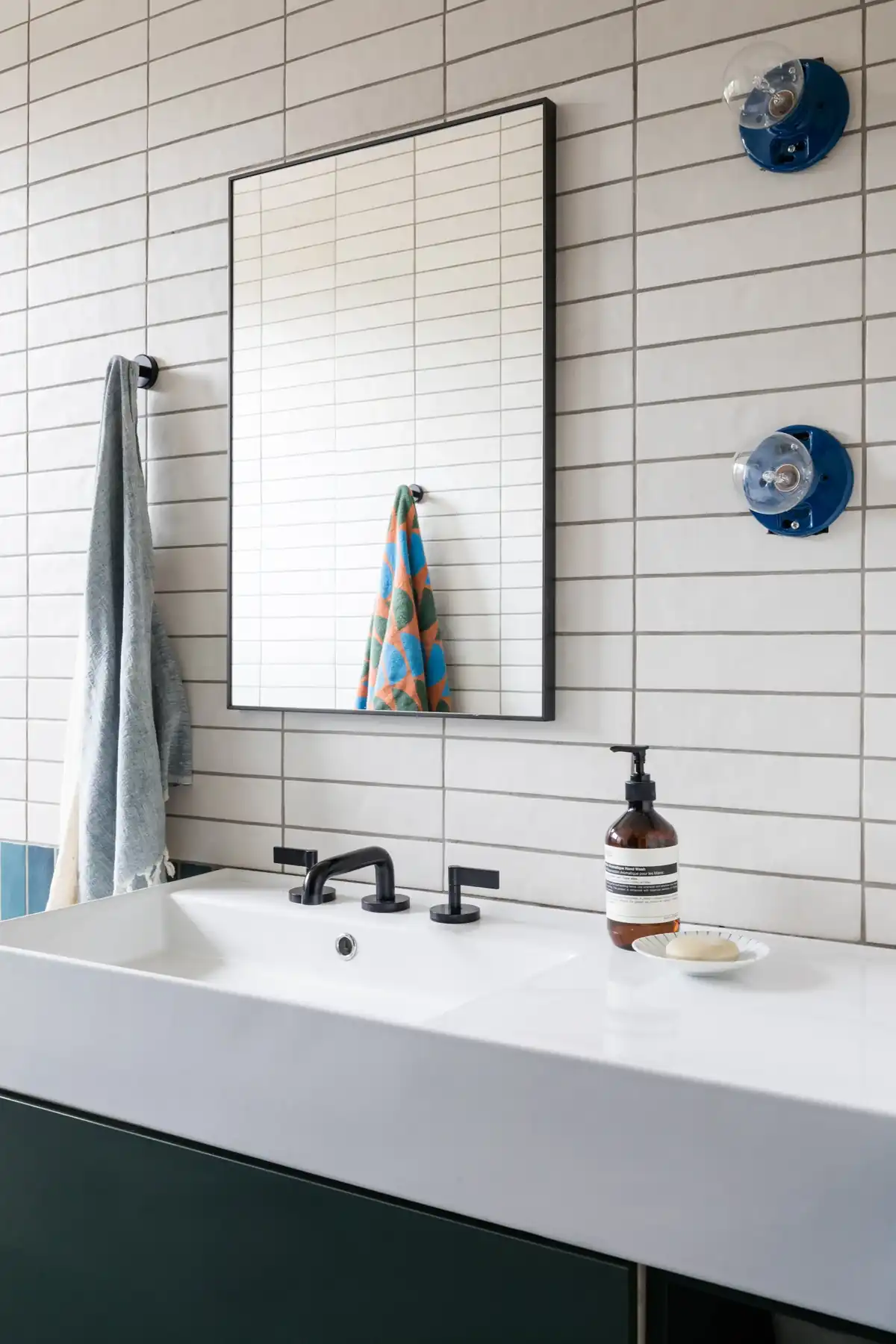 Blue tile bath vanity with black fixtures, Princeville, Kauai