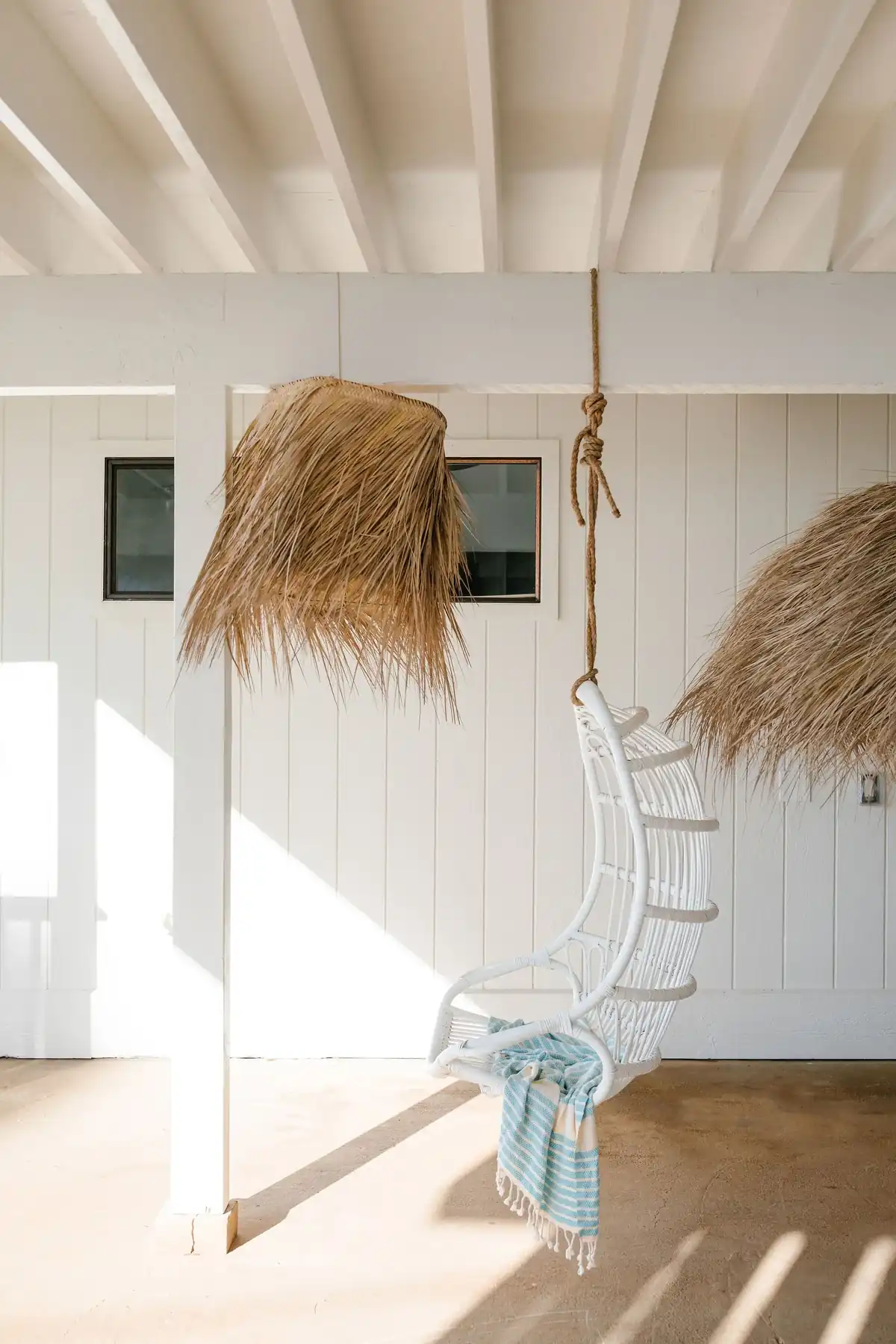 Rattan swings on the lanai, Anini Beach cottage, Kauai