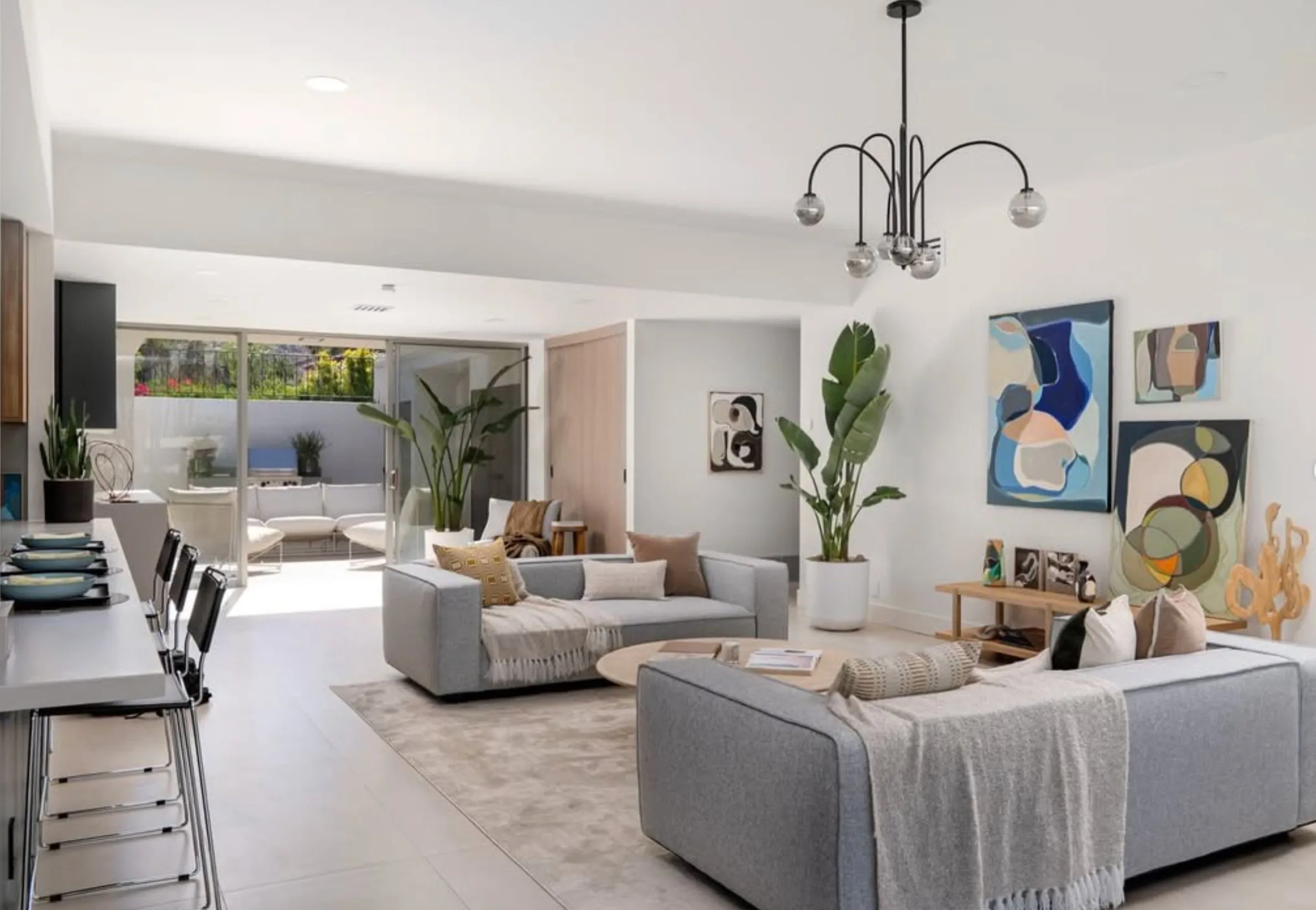 Staged living room hung with original Lynda Keeler paintings, Seven Lakes, Palm Springs